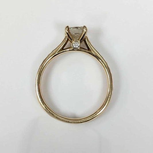 1.46 CT.T.W. Radiant-cut Diamond Engagement Ring in 14k Gold with Peek-A-Boo Diamond