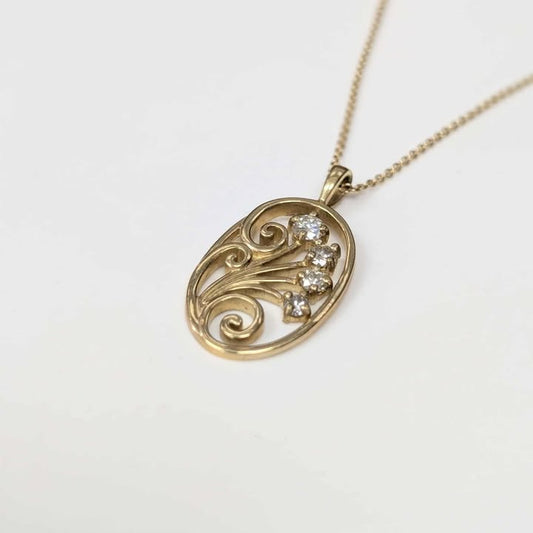 Diamond Swirl Necklace in 14k Gold