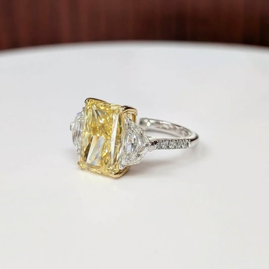 5.65 CT Radiant-cut Yellow Lab Grown Diamond Ring with Trapezoid-cut Side Lab Grown Diamonds & Hidden Halo in 14k White Gold