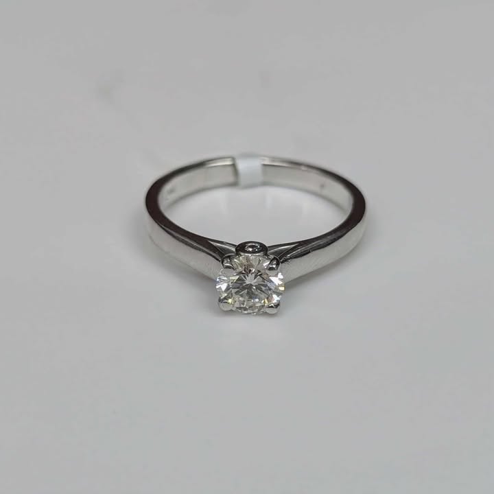 0.68 CT Solitaire "Peek-a-Boo" Engagement Ring in 14k White Gold