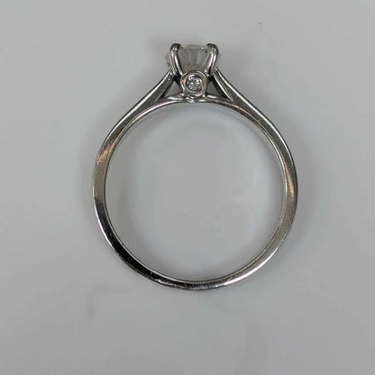 0.68 CT Solitaire "Peek-a-Boo" Engagement Ring in 14k White Gold