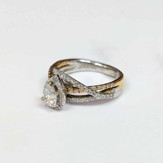 0.87 CT.T.W Framed Pear-cut Diamond Engagement Ring in 14k Two Toned Gold with Twist Shank