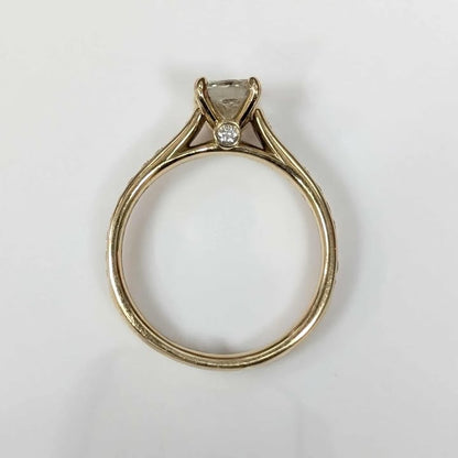 1.46 CT.T.W. Radiant-cut Diamond Engagement Ring in 14k Gold with Peek-A-Boo Diamond