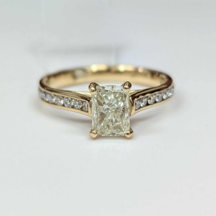 1.46 CT.T.W. Radiant-cut Diamond Engagement Ring in 14k Gold with Peek-A-Boo Diamond