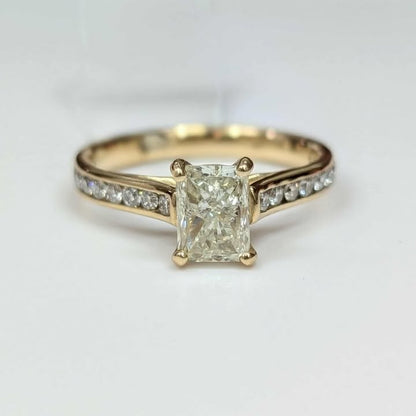 1.46 CT.T.W. Radiant-cut Diamond Engagement Ring in 14k Gold with Peek-A-Boo Diamond