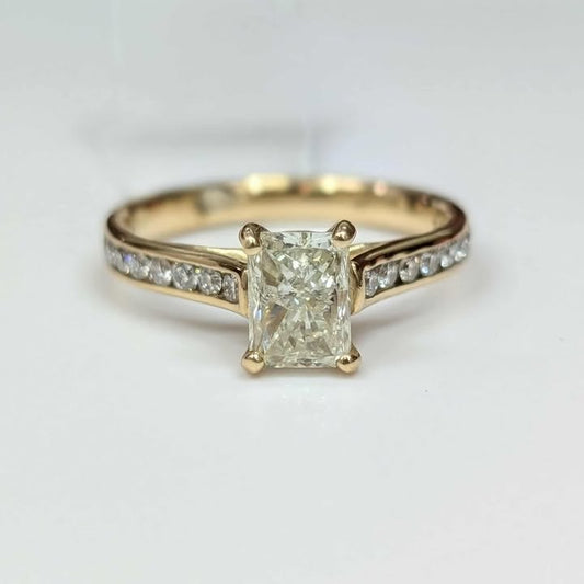 1.46 CT.T.W. Radiant-cut Diamond Engagement Ring in 14k Gold with Peek-A-Boo Diamond