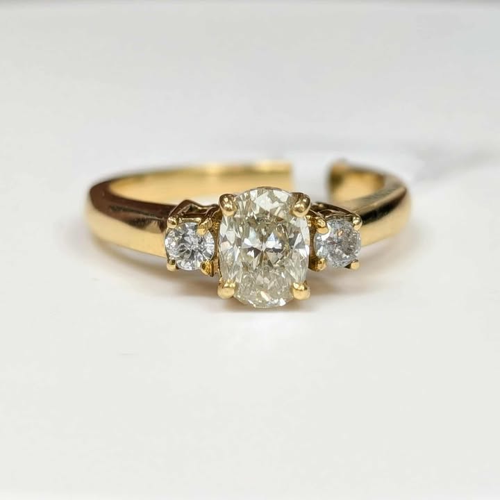 1.20 CT.T.W Three-Stone Oval & Round Diamond Engagement Ring in 14k Gold