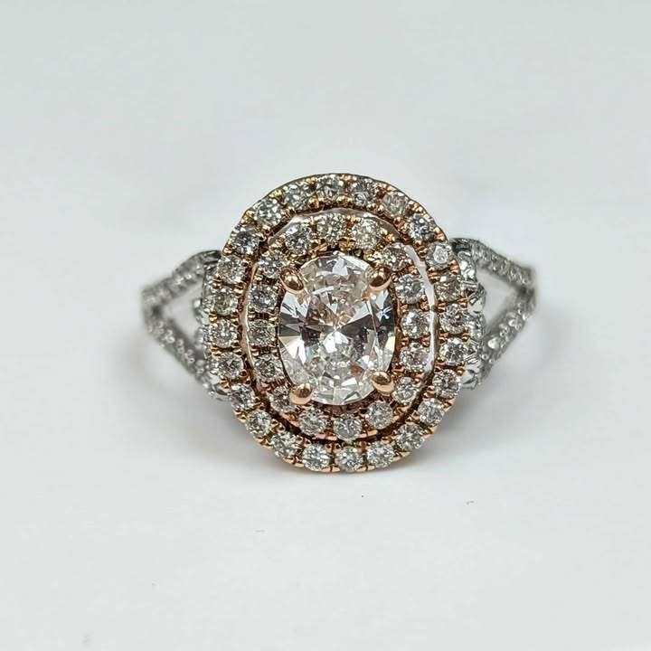 1.22 CT.T.W. Double Framed Oval-cut Diamond Engagement Ring in 14k Two Tone Gold with Heart Accents