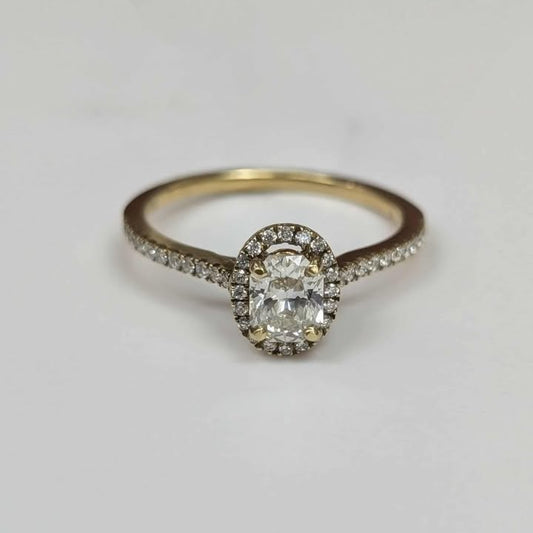 0.69 CT.T.W Framed Oval-cut Diamond Engagement Ring in 18k Gold