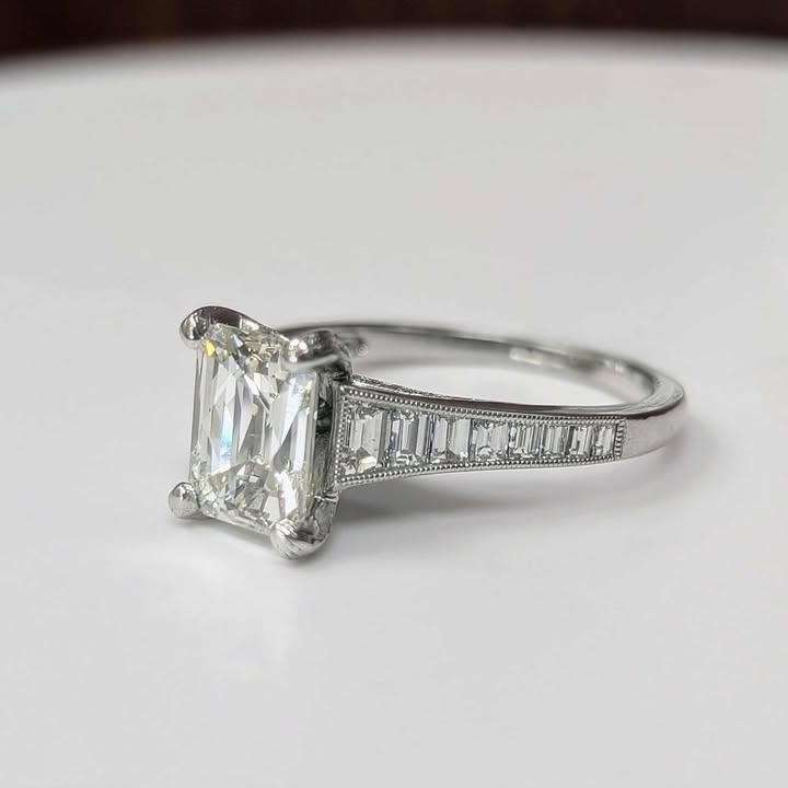 1.97 Modified Emerald-Cut Diamond Engagement Ring with Hidden Halo, Side Accent Diamonds, Baguette Band, and Milgrain Details in 14k White Gold