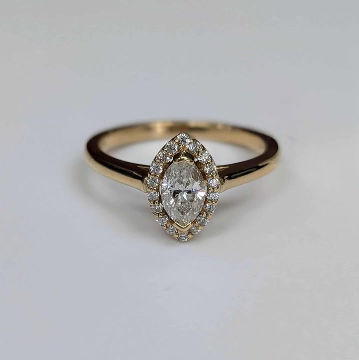 0.70 Framed Marquis-cut Diamond Engagement Ring in 14k Gold