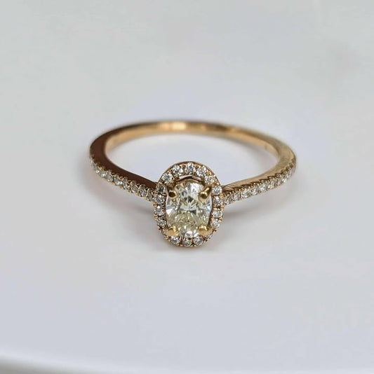 0.62 CT.T.W Framed Oval-cut Diamond Engagement Ring in 18k Rose Gold