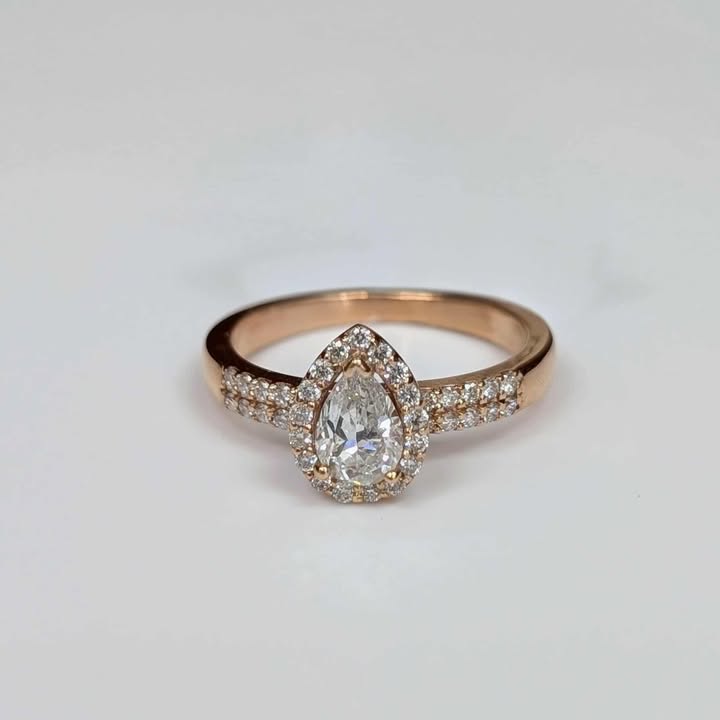 0.88 CT.T.W Framed Pear-cut Diamond Engagement Ring with Two-Row Diamond Band in 14k Rose Gold