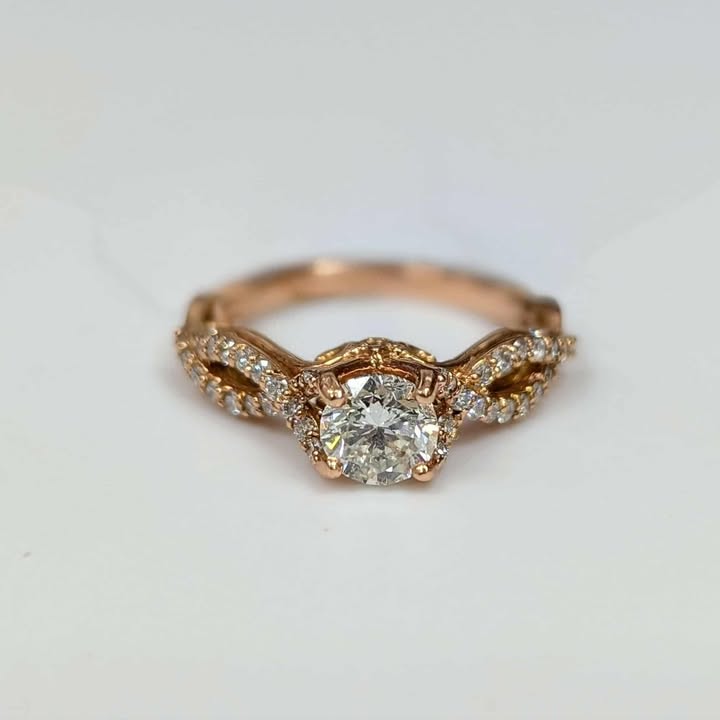 0.97 CT.T.W Diamond Twist Shank Engagement Ring with Side Diamond Accents in 14k Rose Gold