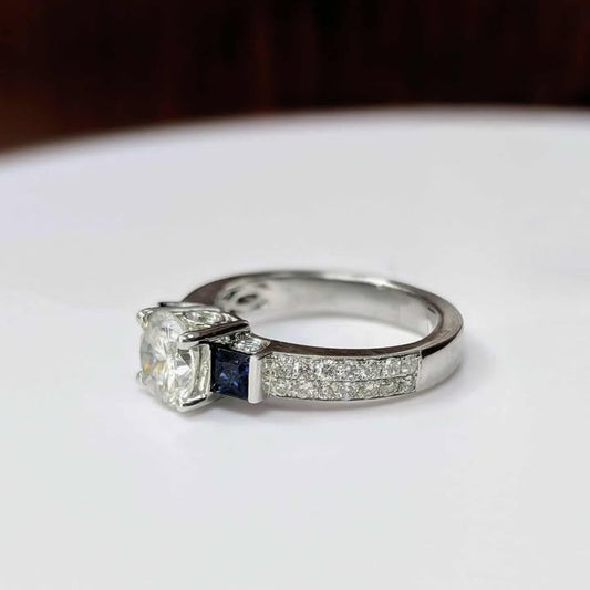 1.49 CT.T.W Three Stone Diamond Engagement Ring with Round-cut Center Stone, Blue Sapphire Side Stones, Two-Row Band, & Peek-A-Boo Diamond Accents in 14k White Gold