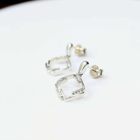 0.15 CT.T.W Diamond Accented Square Dangle Earrings in 14k White Gold