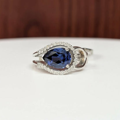 East West Set Pear-cut Blue Sapphire Ring with Sweeping Diamond Frame in 14k White Gold