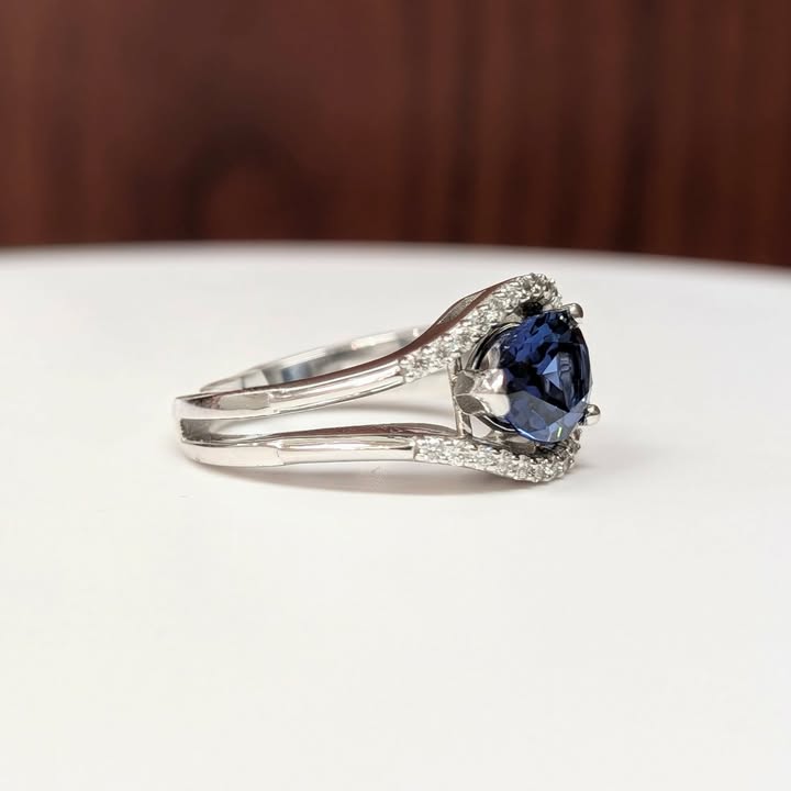 East West Set Pear-cut Blue Sapphire Ring with Sweeping Diamond Frame in 14k White Gold
