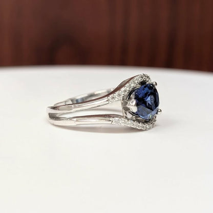 East West Set Pear-cut Blue Sapphire Ring with Sweeping Diamond Frame in 14k White Gold