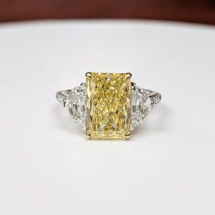 5.65 CT Radiant-cut Yellow Lab Grown Diamond Ring with Trapezoid-cut Side Lab Grown Diamonds & Hidden Halo in 14k White Gold