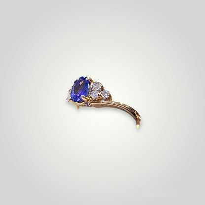 Oval Tanzanite Ring with Accent Diamonds